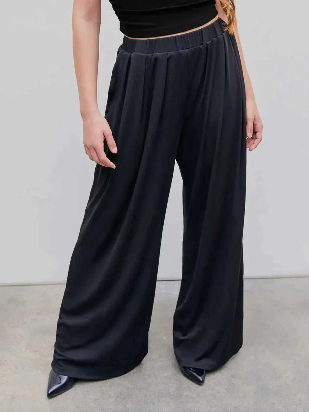 Broek met Hoge Elastiek en Wijde Pijpen