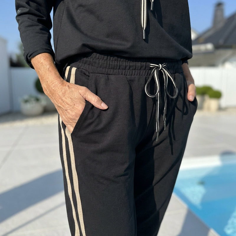 🎁2026 Nieuw binnen 50% KORTING💥Damesjas met capuchon en broek met trekkoord