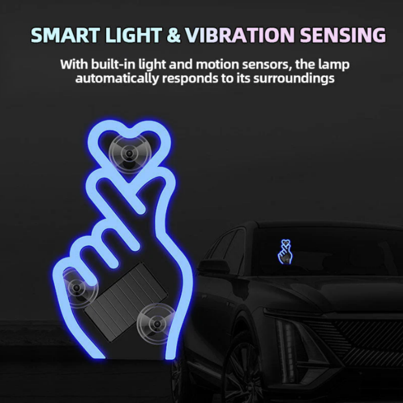 🚗💡 Laat je auto liefde uitstralen💖 Nieuwjaarsactie: Zonne-energie LED Autolamp – Vingerhart Design -50%