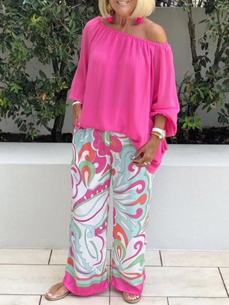 Tweedelig setje met damesbroek en off-shoulder top