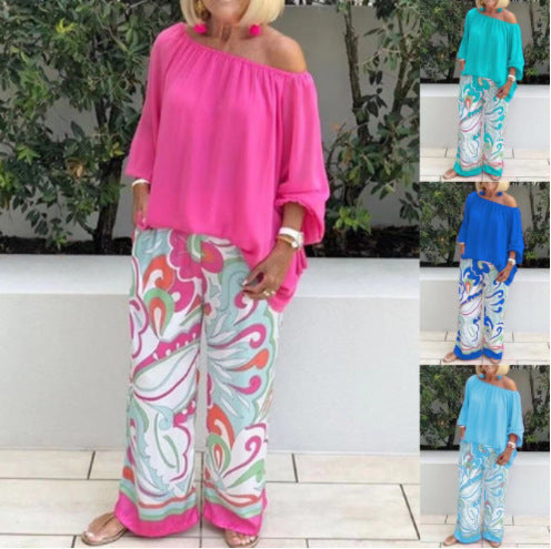 Tweedelig setje met damesbroek en off-shoulder top