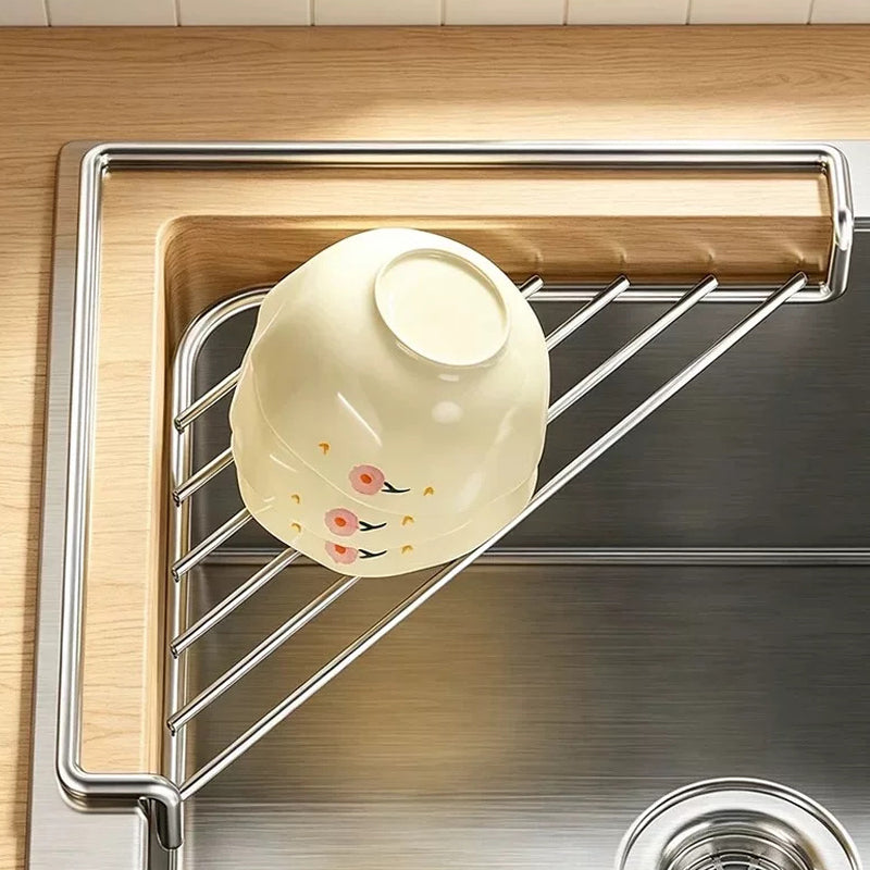 💧🧽 50% KORTING! Alsof je een onzichtbare butler in je gootsteenhoek hebt die je sponzen droog en je aanrecht vrij houdt! Geen waterplassen meer, geen rommel – alleen een opgeruimde gootsteen.